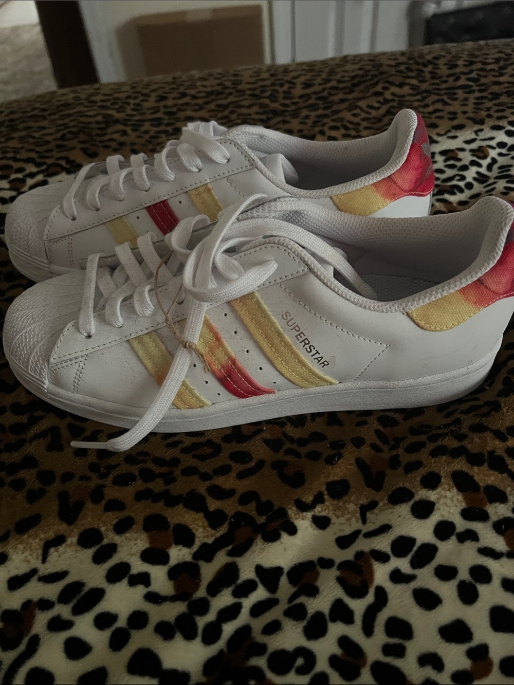 adidas Superstar White Sneakers with Red and Yellow Accent